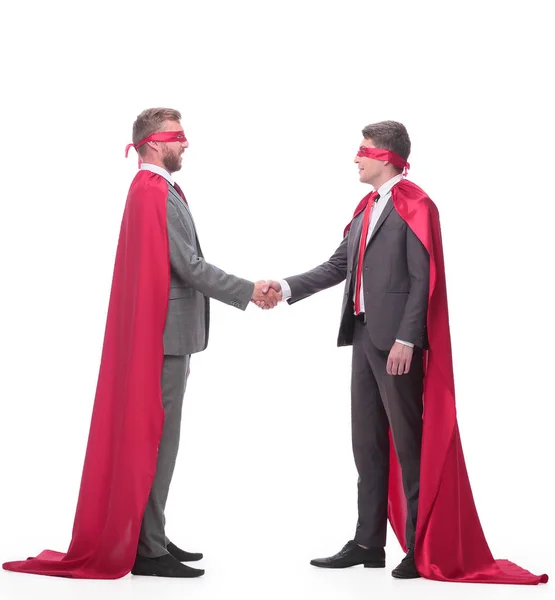 Two businessman in superhero capes shake hands — Stock Photo, Image