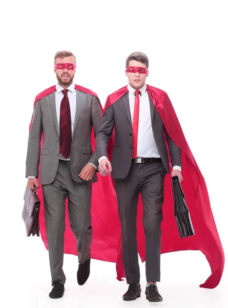 Business partners in superhero capes walking together. — Stock Photo, Image