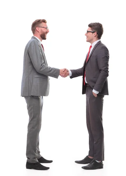 В полном росте. Два бизнесмена пожимают друг другу руки . — стоковое фото
