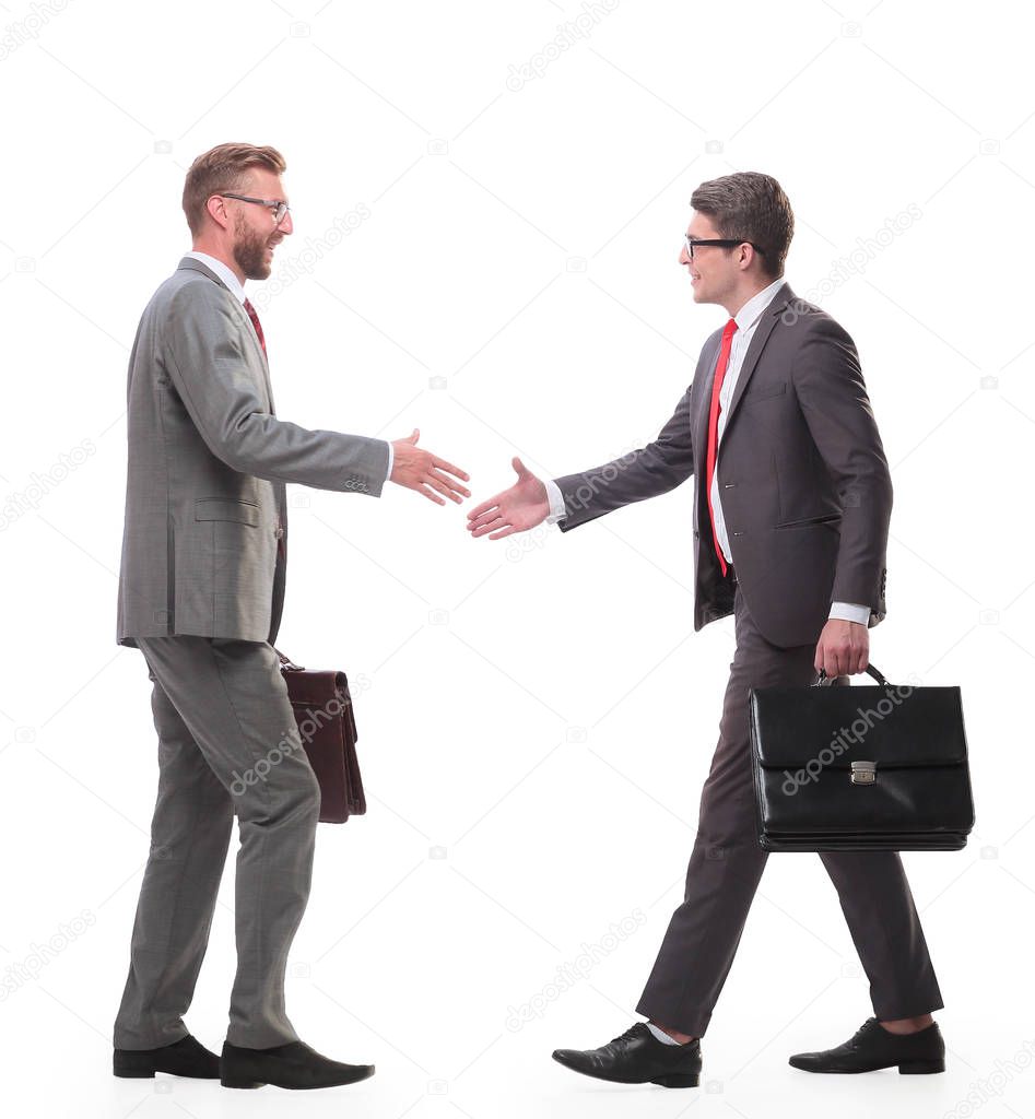 two business men holding out their hands towards each other