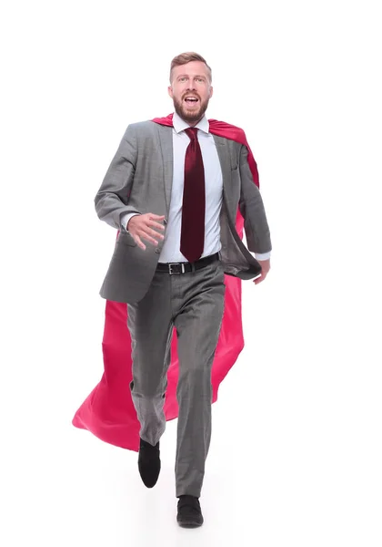 Businessman in a superhero raincoat striding confidently forward. — Stock Photo, Image