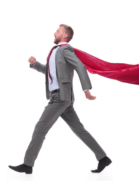 Side view. businessman superhero striding towards his goal — Stock Photo, Image