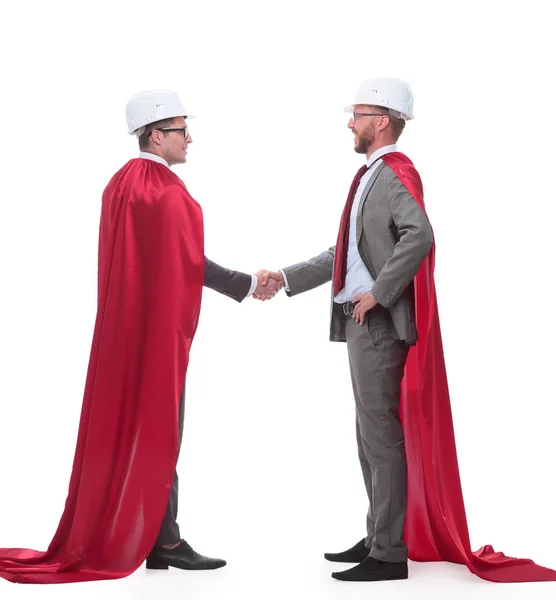 Architect and developer in capes super heroes shaking hands — Stock Photo, Image