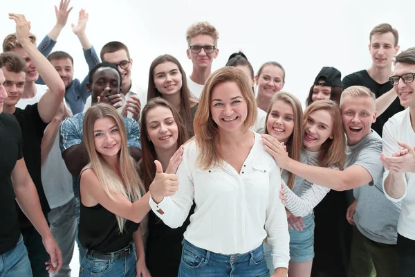 De cerca. mujer muy feliz de pie entre sus amigos — Foto de Stock