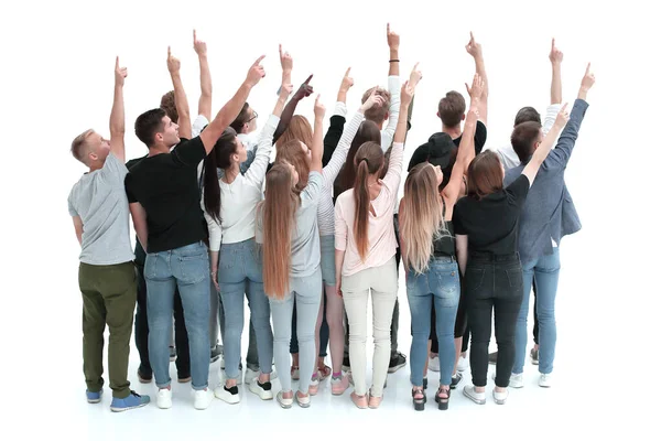 Großes Team junger Leute, die irgendwo nach oben zeigen . — Stockfoto