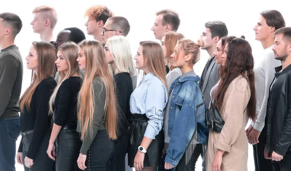 Group of young people standing behind each other — Stock Photo, Image