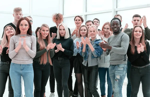 Group of young people applauding . photo with copy space. — Stock Photo, Image