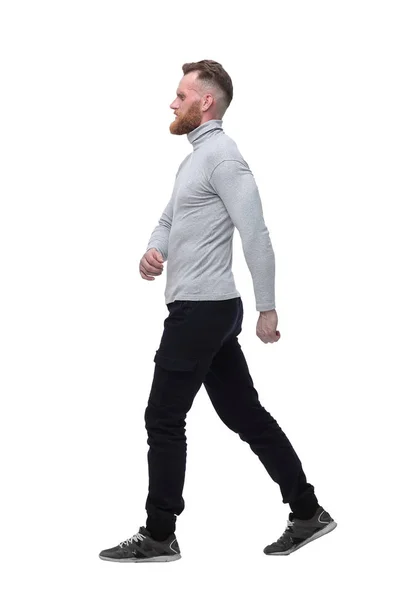 Χαρισματικός μουσάτος άνθρωπος περπατάει μπροστά. απομονώνονται σε λευκό φόντο — Φωτογραφία Αρχείου