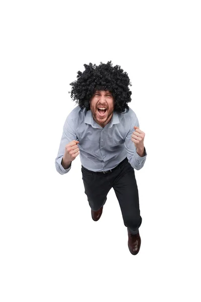 Top view. happy man in wig looking at camera — Stock Photo, Image