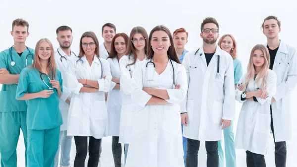 Top view. a group of smiling doctors pointing at you. — Stock Photo, Image