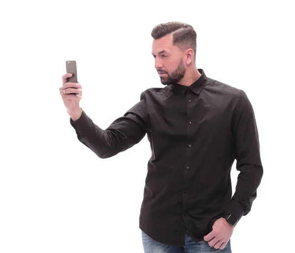 V plném růstu. mladý muž v džínách brát selfie — Stock fotografie