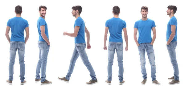 Zijaanzicht. moderne jongeman in jeans. — Stockfoto