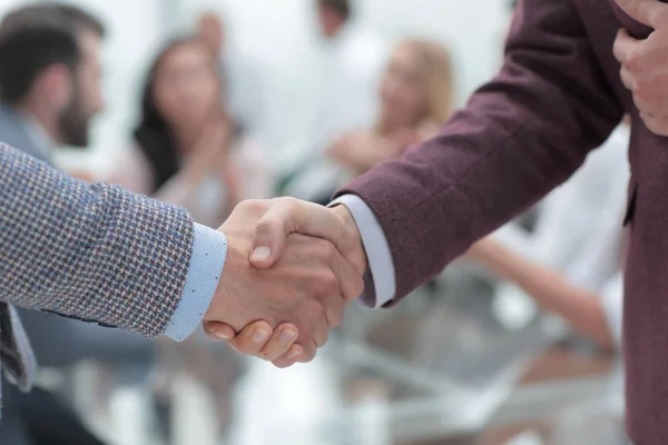 Close up. handshake of business men on the office background — Stock Photo, Image