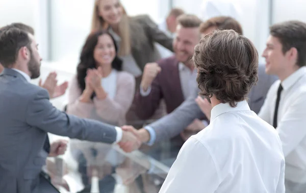 Business partners shaking hands as a sign of cooperation — Stock Photo, Image