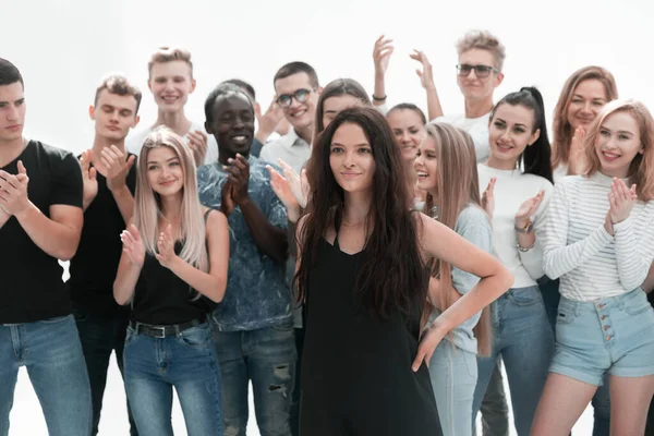Крупний план. група молодих людей аплодує своїй перемозі — стокове фото