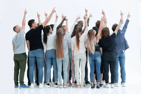 Skupina různých mladých lidí, kteří poukazují na kopii prostoru — Stock fotografie