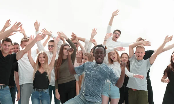 Geschlossene Gruppe glücklicher junger Menschen mit erhobenen Händen — Stockfoto