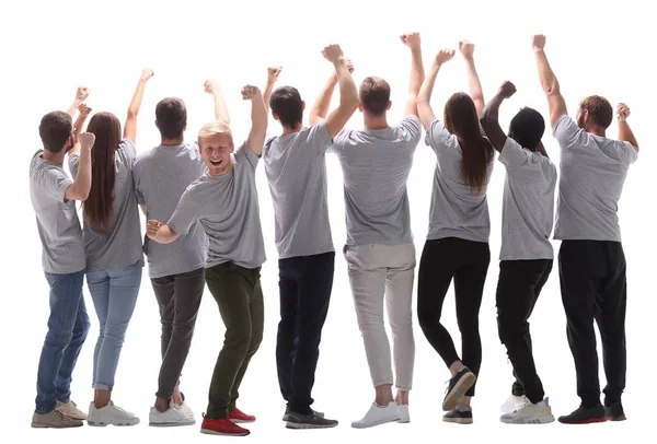 Rear view. happy guy and his jubilant friends standing together — Stock Photo, Image