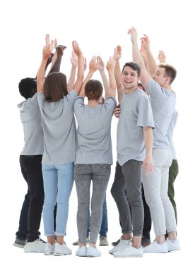 Tam gelişim. Bir grup genç ellerini kaldırarak bir çember oluşturuyorlar..