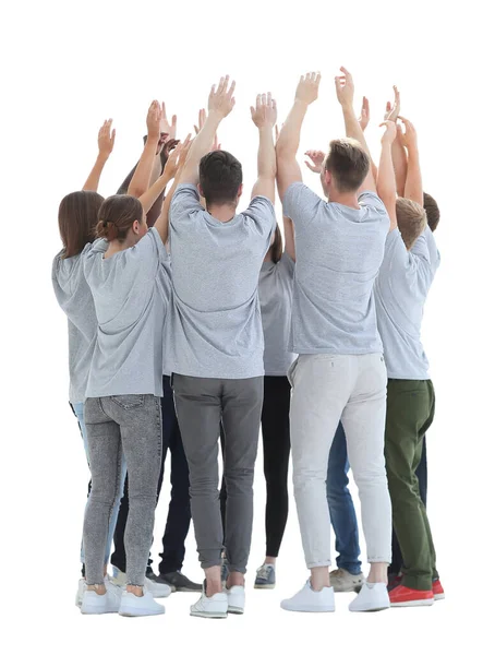 In full growth. group of young people standing in a circle with hands up. — Stock Photo, Image