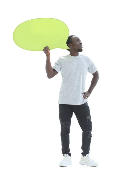 In full growth. handsome guy looking at blank speech bubble — Stok fotoğraf