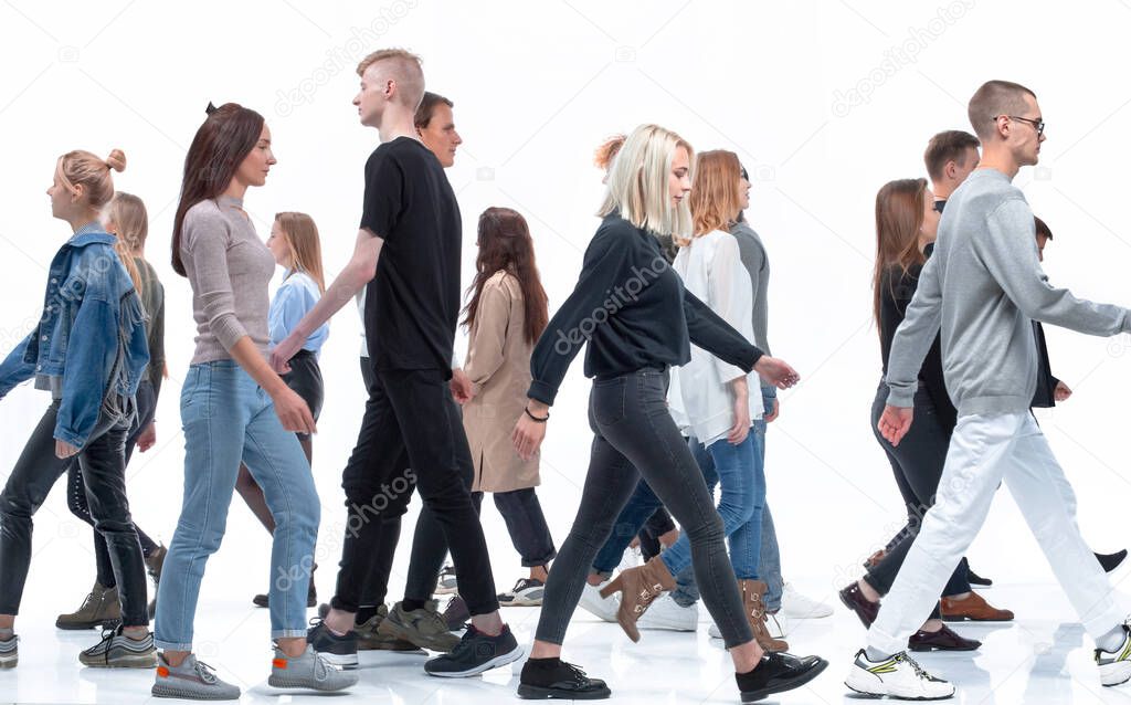 casual young people walking in different directions
