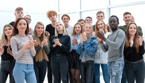 Group of young people applauding . photo with copy space. — Stock Photo, Image