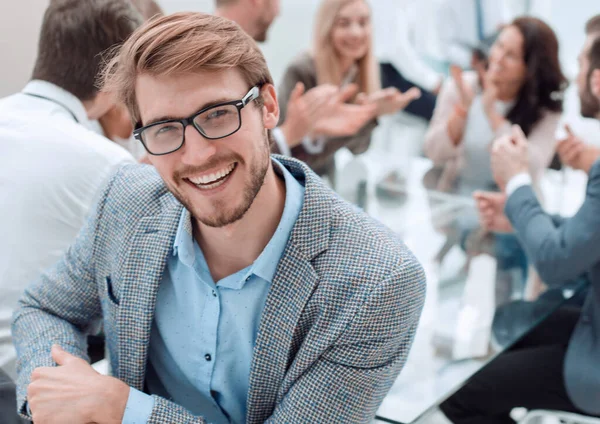 Successful business man on the background of the office — Stock Photo, Image