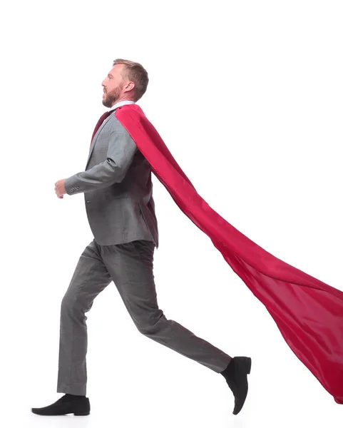 Вид сбоку. бизнесмен супергерой шагает к своей цели — стоковое фото