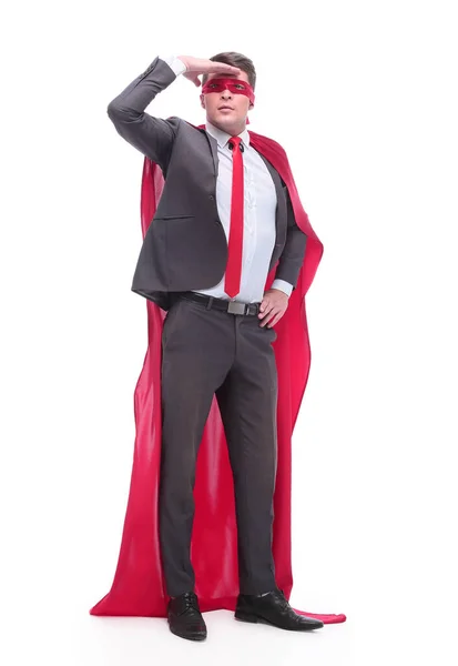 Attentive superhero businessman looking into the distance — Stock Photo, Image