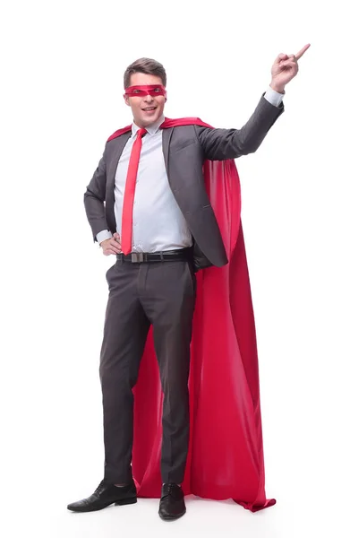 Smiling superhero businessman pointing to copy space — Stock Photo, Image