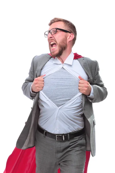 Целеустремленный бизнесмен в супергероическом плаще порвал свою рубашку — стоковое фото