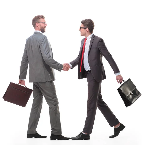 Két üzletember egymás felé nyújtja a kezét. — Stock Fotó
