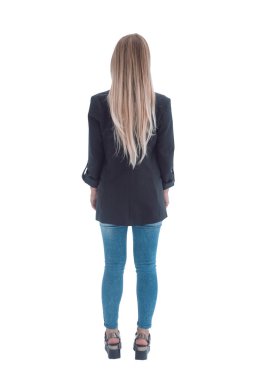 Dikiz aynası. Siyah ceketli genç bir kadın, beyaz duvara bakıyor..