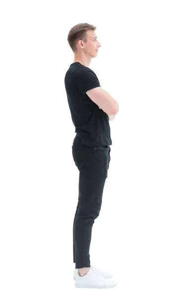 Sidovy. en självsäker ung man i svart t-shirt — Stockfoto