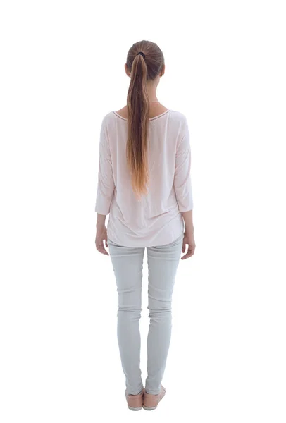 Вид ззаду. випадкова молода жінка дивиться на білий порожній екран . — стокове фото