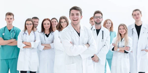 Bovenaanzicht. een groep lachende dokters die naar je wijzen. — Stockfoto