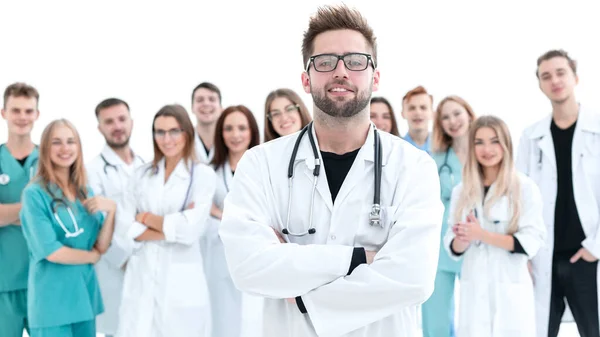 Top view. a group of smiling doctors pointing at you. — Stock Photo, Image