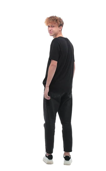 Rear view. a man in a black t-shirt looking at the camera — Stock Photo, Image