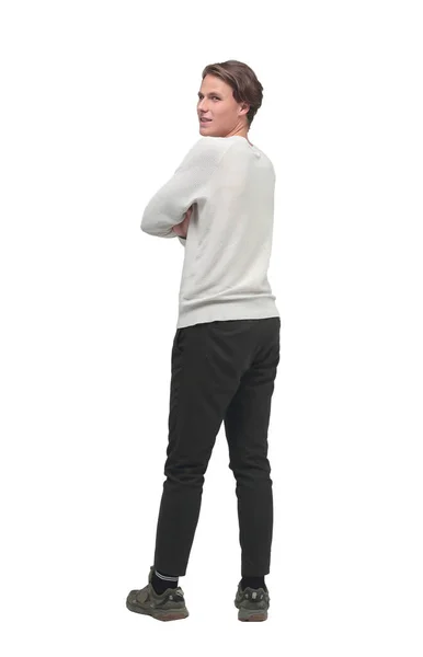 Rear view. stylish young man looking at blank white wall. — Stock Photo, Image