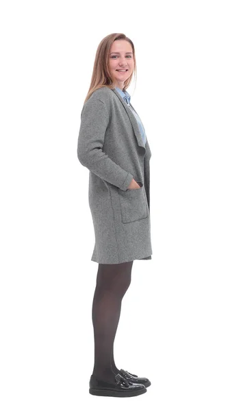 Vue latérale. une jeune femme en manteau gris . — Photo