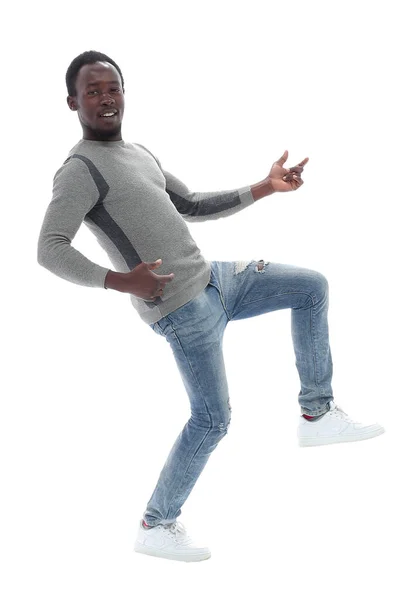 Seitenansicht. fröhlich tanzender junger Mann. isoliert auf weiß — Stockfoto
