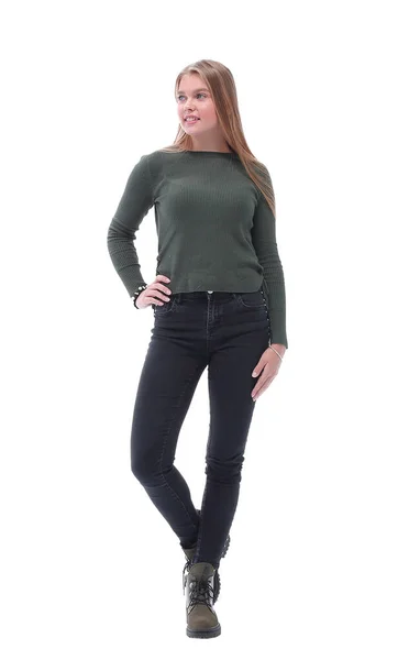 In volle groei. stijlvolle jonge vrouw in grijze longsleeve en jeans. — Stockfoto