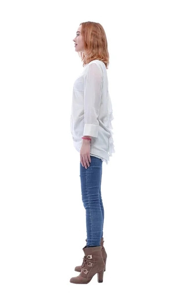 Vue latérale. confiant jeune femme à la mode en jeans et bottes hautes — Photo