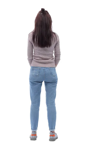 Vista posteriore. casual giovane donna cerca schermo bianco vuoto — Foto Stock