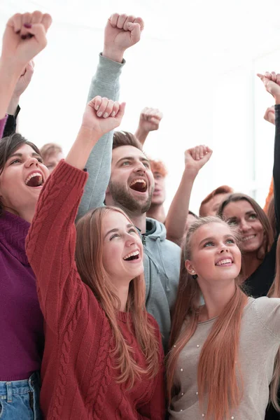 Close up. young people rejoice in their achievements — Stock Photo, Image