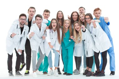 Üst Manzara. Bir grup gülümseyen doktor seni işaret ediyor..