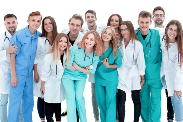 Bovenaanzicht. een groep lachende dokters die naar je wijzen. — Stockfoto