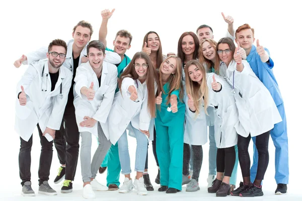 Top view. a group of smiling doctors pointing at you. — Stock Photo, Image