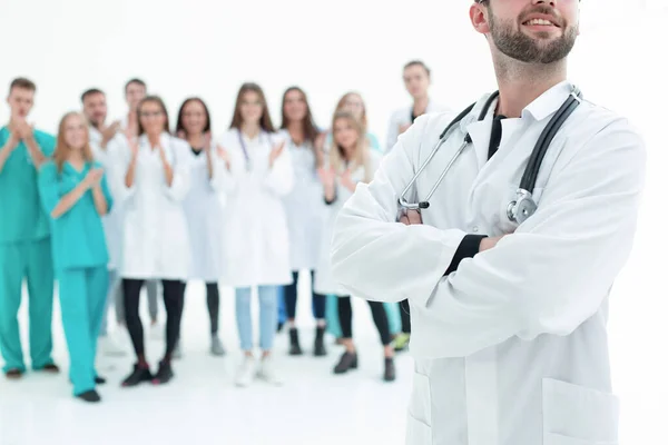 Top view. a group of smiling doctors pointing at you. — Stock Photo, Image